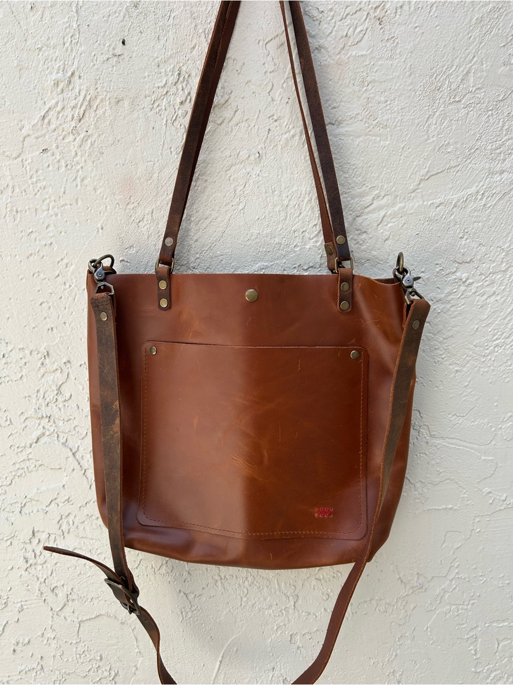 in blue handmade leather Full Grain Leather Bag In Brown